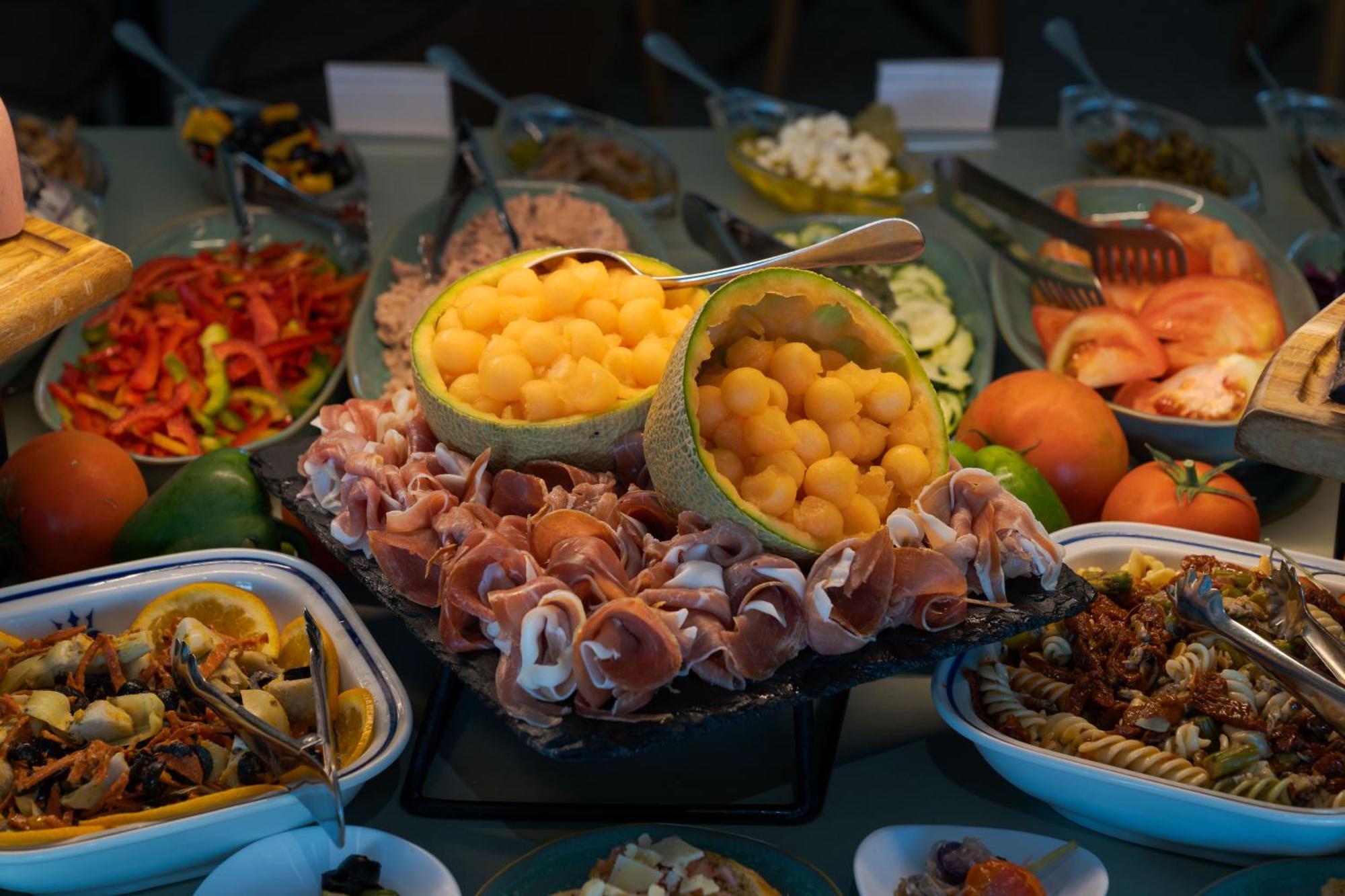 Pestana Blue Alvor Beach Exterior photo A selection of tapas